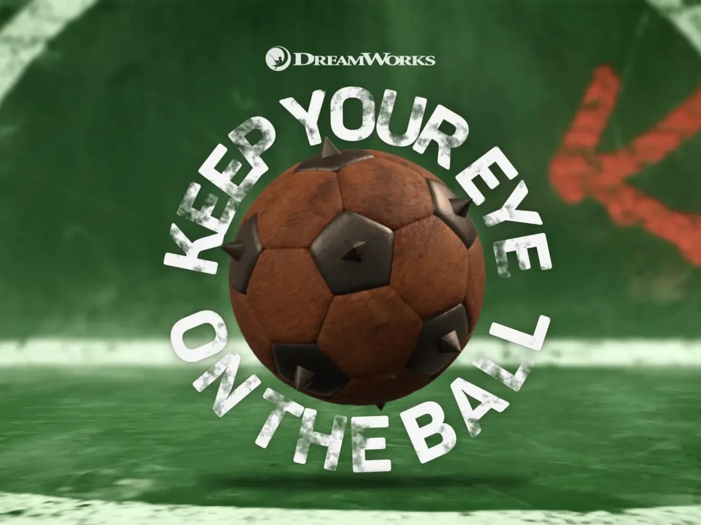 A wooden, iron-spiked football surrounded by Keep Your Eye on the Ball lettering in a finished Kung Fu Panda game graphic