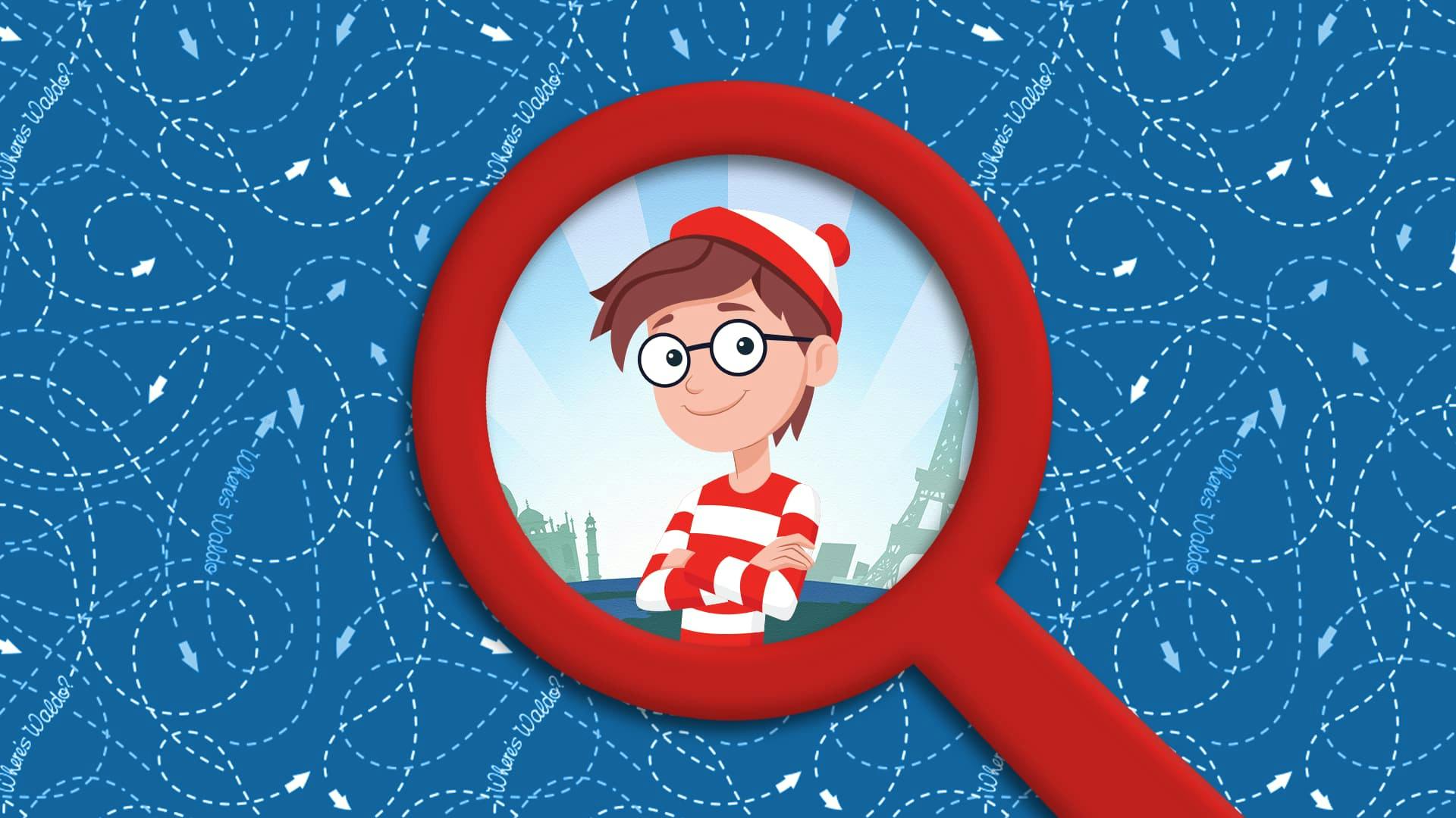 Wally from Where's Wally stands in the centre of a giant magnifying glass.